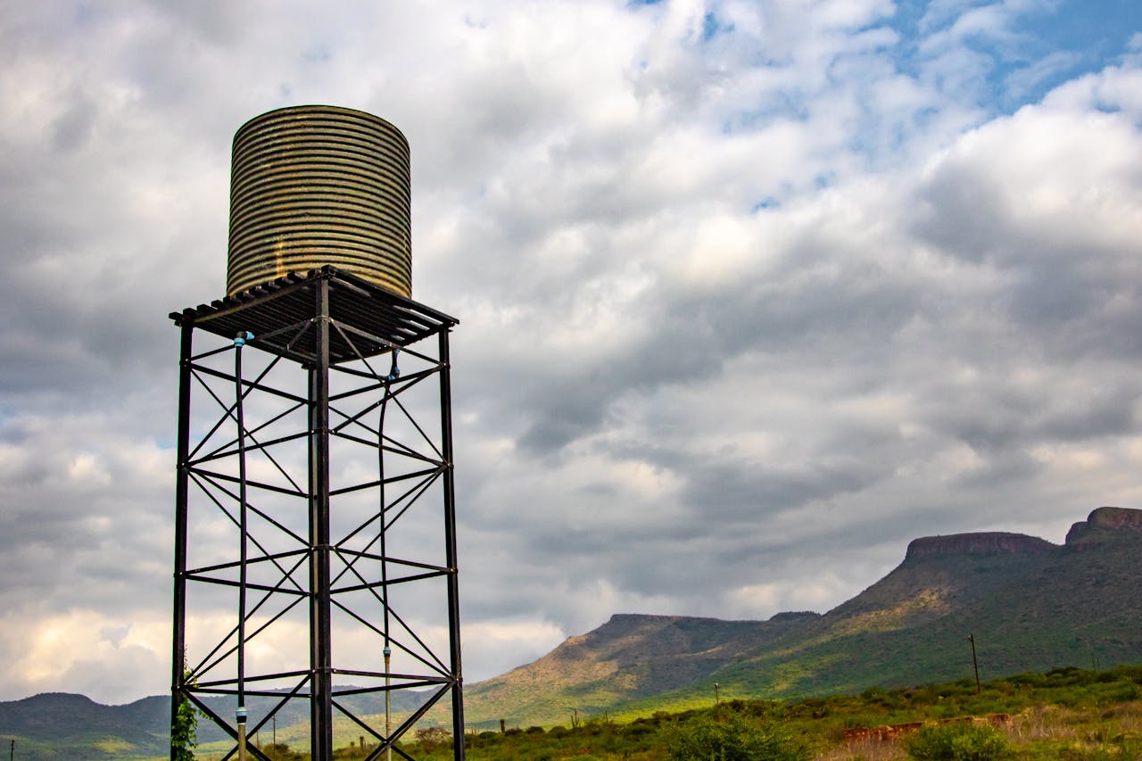 A Water Tank under a Cloudy Sky